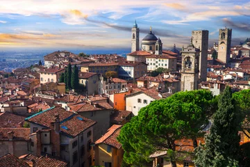 Foto op Canvas Italian historic landmarks and beautiful medieval towns - Bergamo, old town, view with towers over sunset. Lombardia, Italy © Freesurf