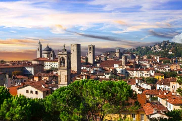 Foto op Canvas Italian historic landmarks and beautiful medieval towns - Bergamo, old town, view with towers over sunset. Lombardia, Italy © Freesurf