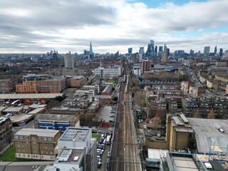 Docklands light railway East London UK drone aerial view