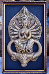 Beautiful handmade sculpture of Goddess devi Durga displayed in a shop for sale