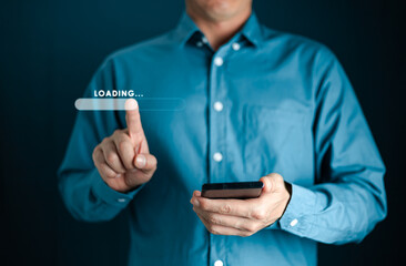 Businessman using smartphone and touching to virtual download bar and loading for New Year and changing year 2022 to 2023. start up planing business in next years concept