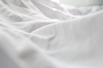 The clean white blanket looks cozy.