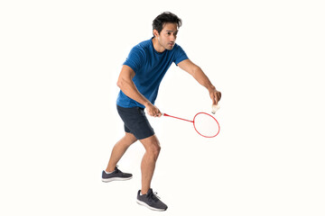 A badminton player in sportswear stands holding a racket and shuttlecock.
