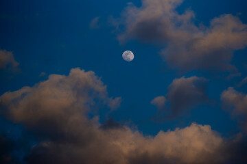 landscape early morning sky moon and clouds on a blue background