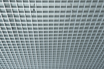 grid ceiling background is beautiful because it is designed to cover traces of original ceiling resulting in modern grid ceiling pattern. backdrop of ceiling is decorated with steel in grid pattern.