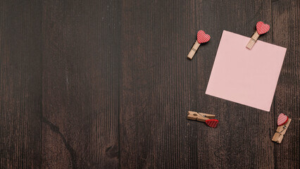 Valentine's day background. Love letter, Valentines card, greeting card, holiday letter on office wooden desk. Flat lay.