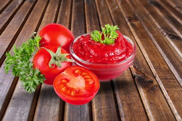 Ripe tasty fresh tomatoes and sauce.