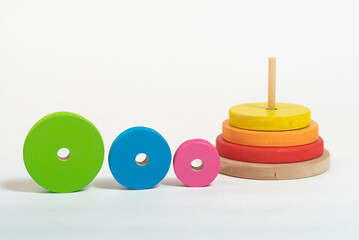 wooden tower educational toy on white background.