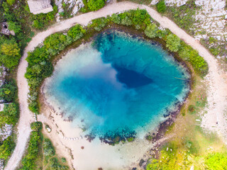 cetina river spring in croatia, a unique deep river spring with crystal clear blue and turquoise water