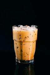 ice coffee with milk on dark background