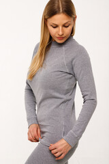 Sporty blonde girl in thermal clothing for women