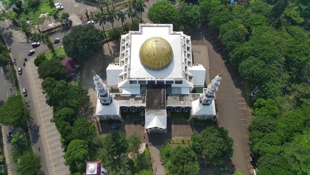 4K footage aerial view of the Baitul Faidzin Grand Mosque at noon in the middle of the central government administration.