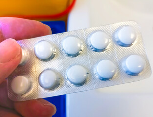 blister pack with prescription medication tablets in a medical consultation