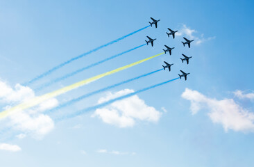 Planes group fly with color trail of Sweden, Ukraine, Bahamas