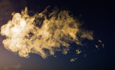 Light smoke or powder texture on a dark background
