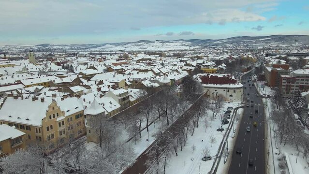 Drone video of the city center of Sibiu, Romania. Footage was taken from a drone at a lower altitude, in winter season, above the boulevard, Haller Bastion and the Wall Street. 