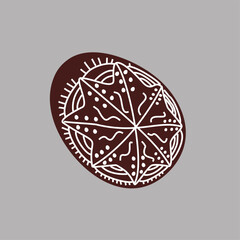 Hand drawn Easter egg with white lines on a brown background. Ethnic traditional motif ukrainian national pattern swirls
