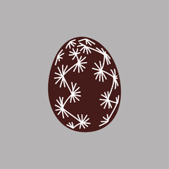Hand drawn Easter egg with white lines on a brown background. Ethnic traditional motif ukrainian national pattern swirls
