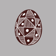 Hand drawn Easter egg with white lines on a brown background. Ethnic traditional motif ukrainian national pattern swirls
