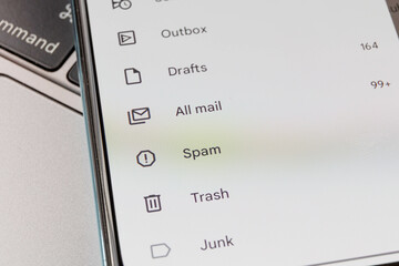 Spam in email inbox. Email inbox on smartphone - junk, trash, spam