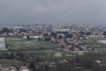 Fototapeta na wymiar Panoramic view of a French town with snow