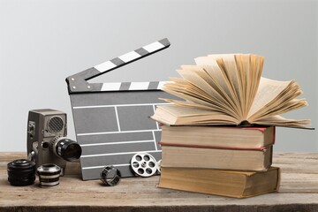 Set old books and Movies slate on the desk