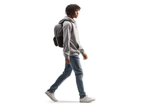 Full Length Profile Shot Of An African American Male Student Walking