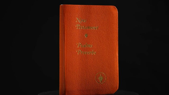 Bible on black background