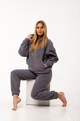 Fototapeta premium Sporty blonde girl in thermal clothing for women