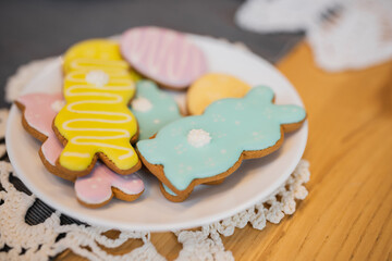 Close up view of Easter cookies on table at home.