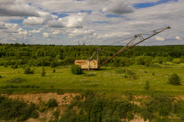 Drone photography of old abandoned excavator in quarry