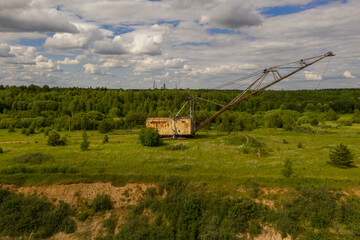 Fototapeta premium Drone photography of old abandoned excavator in quarry