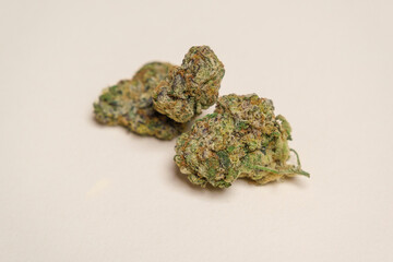 Quality outdoor marijuana, cannabis, weed buds on a white background