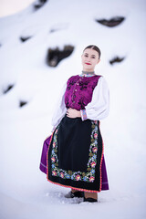 Young beautiful slovak woman in traditional costume. Slovak folklore