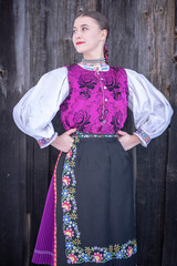 Young beautiful slovak woman in traditional costume. Slovak folklore