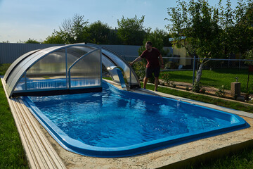 Swimming pool near the terrace in the courtyard of the house.