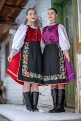 Beautiful woman wearing traditional Eastern Europe folk costumes. Slovak folk costumes.