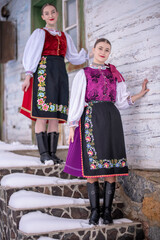 Beautiful woman wearing traditional Eastern Europe folk costumes. Slovak folk costumes.