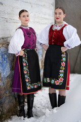 Beautiful woman wearing traditional Eastern Europe folk costumes. Slovak folk costumes.