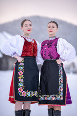 Beautiful woman wearing traditional Eastern Europe folk costumes. Slovak folk costumes.