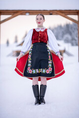 Young beautiful slovak woman in traditional costume. Slovak folklore