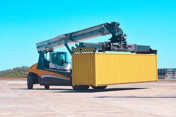 Forklift truck handling container box, loading container in the port.