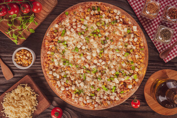 Brazilian pizza with mozzarella, corn, green pepper, pea, hearts of palm and oregano (Pizza...