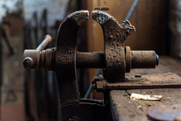 Old rusty vice on a workbench in the workshop of a shipyard in the industrial area of the Port of Hamburg