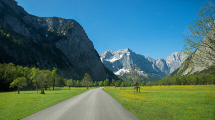 Fototapeta na wymiar country road Ahornboden valley, famous alpine landscape austria tirol, karwendel mountains in spring