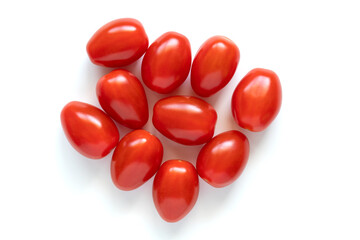 Small red cherry tomatoes isolated on white background