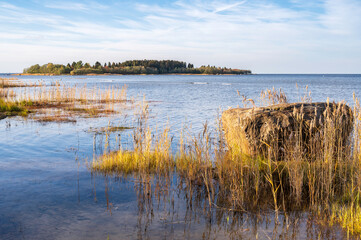 View of beach and an island in the sea. Storsand, Monäs. Nykarleby/Uusikaarlepyy, Finland