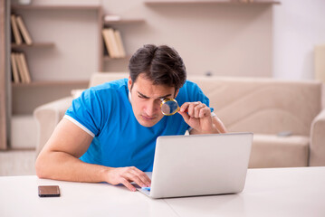 Young man freelancer working from home