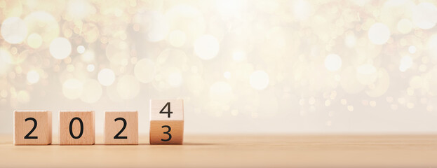 2024 new year goals planning concept, wooden cubes, positive indicator 2024, investment finance planning for the new year 2024.