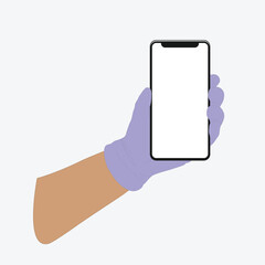 Mobile phone in a man's hand, hand in a medical, rubber glove.